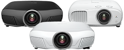 Three Epson home projector models in black and white with glossy lenses